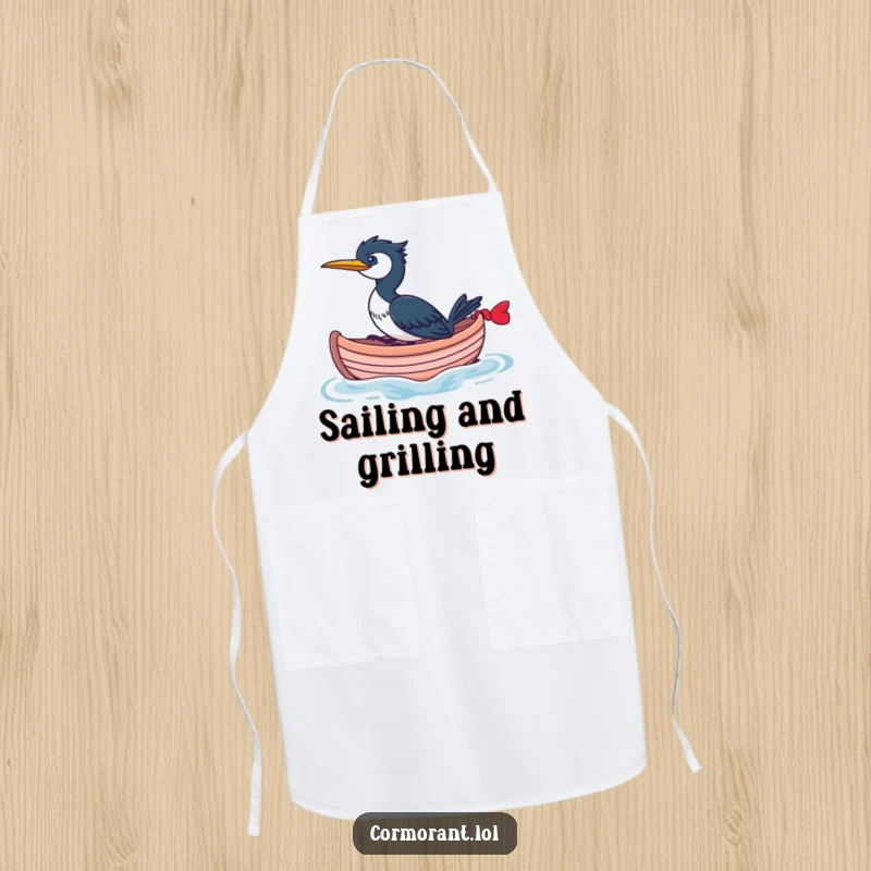 Funny Cormorant Apron showing a cormorant riding a small, whimsical boat, combining kitchen protection with nautical humor.