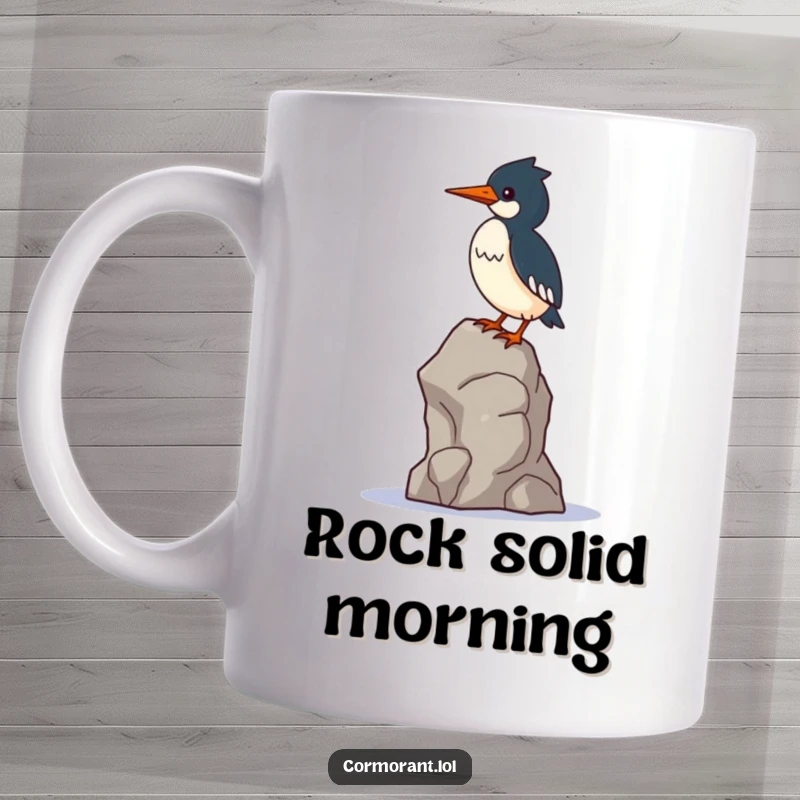 Funny Cormorant Mug: A kawaii cormorant balances precariously on a single, wobbly rock, showing determination and humor.