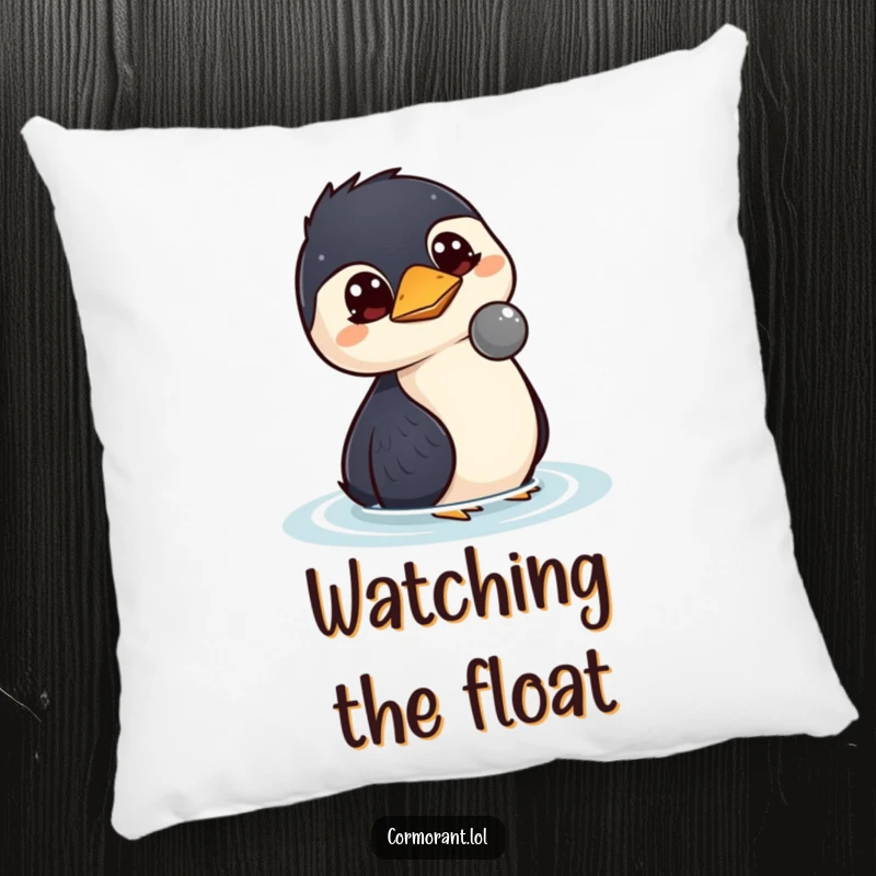 Funny kawaii cormorant pillow featuring a bird with wide, curious eyes watching a floating object, perfect for cozying up.