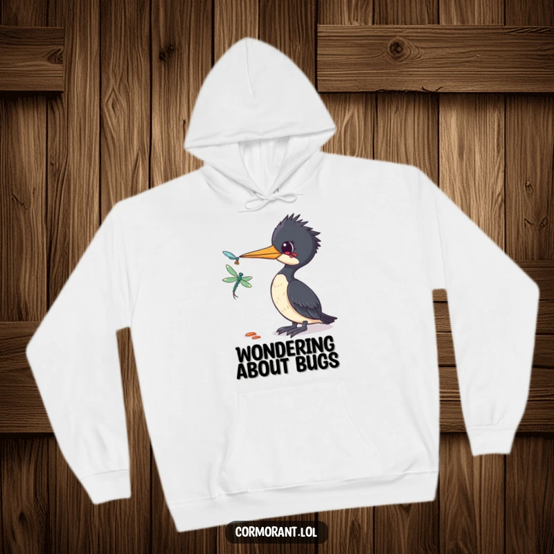 Funny Cormorant Hoodie: A soft hoodie featuring a funny cormorant tilting its head curiously at a dragonfly, capturing a moment of wonder.