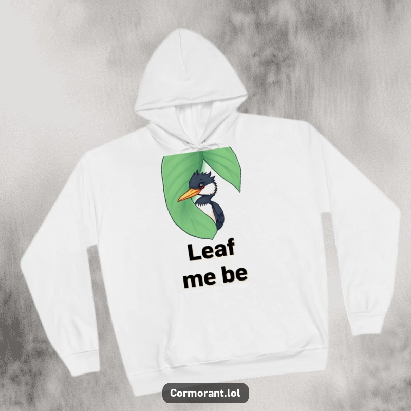Funny Cormorant Hoodie: A charming cormorant playfully peeking from concealment behind a large, wet leaf, embodying a funny stealthy surprise.