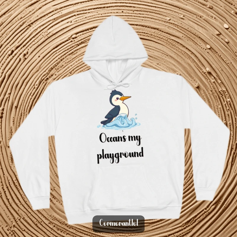 Funny Cormorant Hoodie depicting a cute kawaii bird joyfully chasing a little wave, great for warmth and lighthearted vibes.