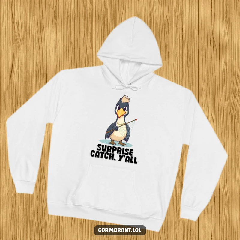 Funny Cormorant Hoodie: A bewildered cormorant with a comically surprised expression holds a misplaced net, offering cozy humor.