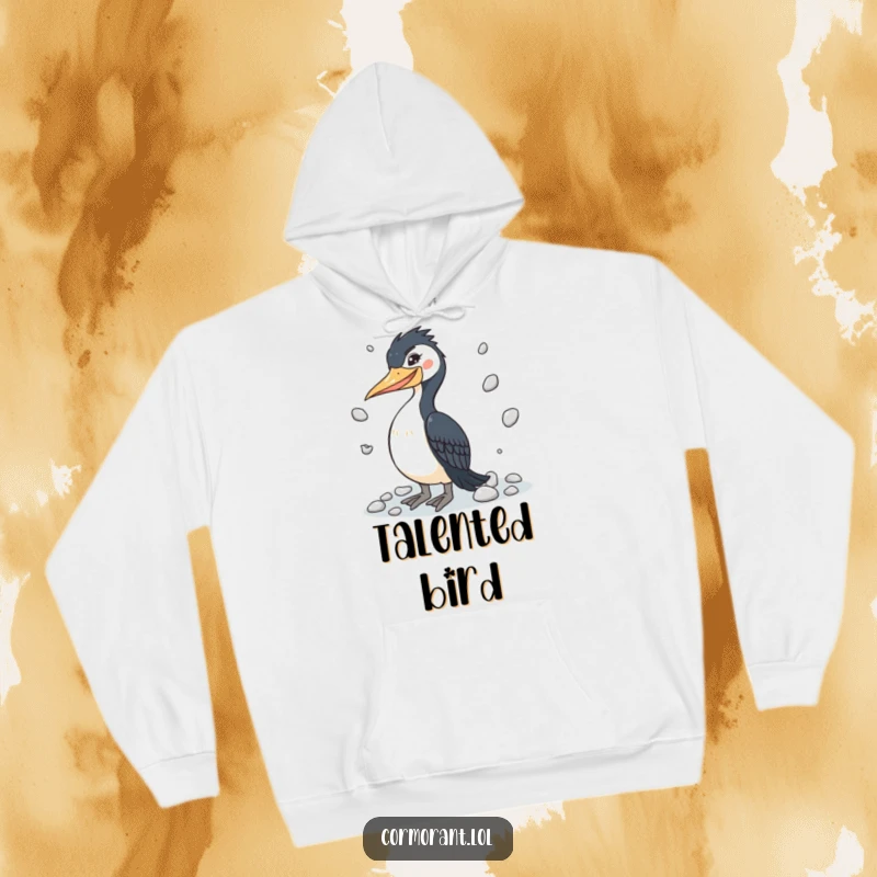 Funny cormorant hoodie depicting a winking bird juggling pebbles, embodying talent and cozy humor.