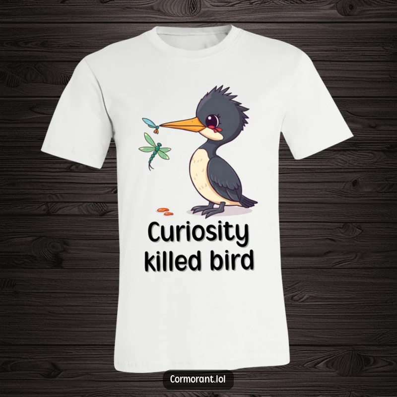 Funny Cormorant T-Shirt: A humorous depiction of a cormorant tilting its head in curiosity towards a delicate dragonfly.